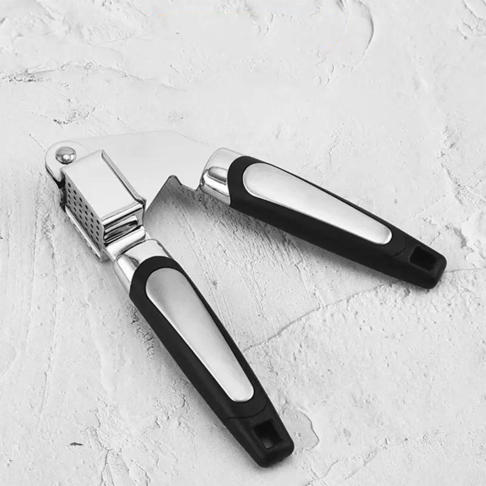 Garlic press tool