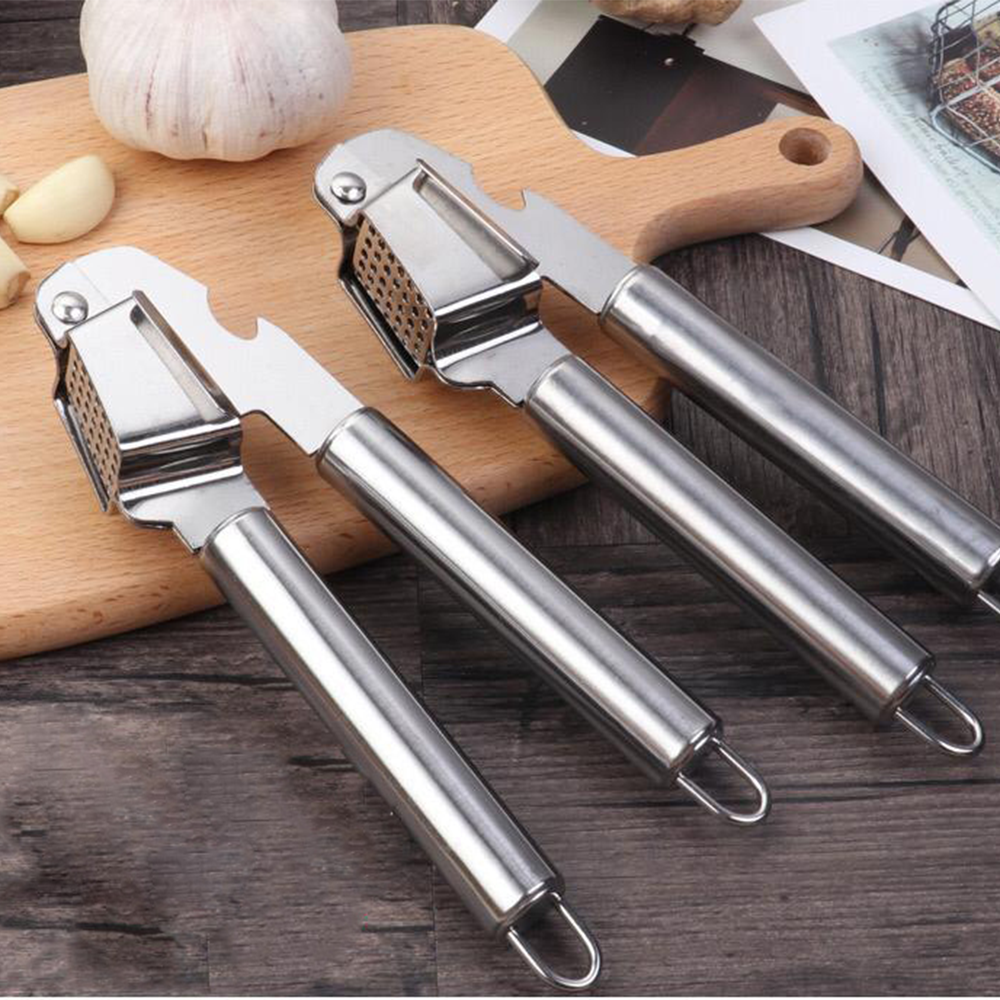 Stainless steel garlic press/ bottle opener